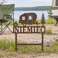 Campsite Custom Metal Sign in Brown hammered powdercoat, personalized with NIEMIEC and planted at a peaceful lakeside campsite.