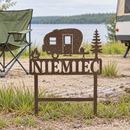 Campsite Custom Metal Sign in Brown hammered powdercoat, personalized with NIEMIEC and planted at a peaceful lakeside campsite.