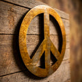 Detailed close-up of peace symbol wall art showcasing 16 gauge steel construction and intricate craftsmanship with textured surface and metallic sheen.