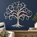 Curly Tree Of Life With Birds Metal Wall Art in Polished Metal / Red Birds finish, mounted on an indoor wall.