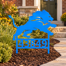 Detroit Lions custom address metal yard art in Honolulu Blue with solid numbers planted beside a landscaped brick-house front entry.