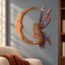Fairy Moon metal wall art in Copper Bronze finish displayed in a blue-gray reading nook.