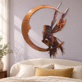 Fairy Moon metal wall art in Firestorm finish displayed in a softly colored bedroom.