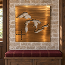 Great Lakes Metal Wall Art in Copper Bronze, featuring lake and compass cutouts in a coordinated indoor lakehouse setting.