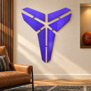 Mamba Logo metal wall art in Candy Grape Metallic finish displayed in a warm basketball-themed lounge.