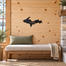 Michigan Upper Peninsula Metal Wall Art in Black, with HOME lettering cut out, displayed in a Northwoods-inspired interior.