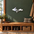 Michigan Upper Peninsula Metal Wall Art in Polished Metal, with HOME lettering cut out, displayed in a Northwoods-inspired interior.