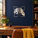 Michigan Wolverines Logo Metal Wall Art in Polished Metal, displayed in an indoor college-football fan setting.