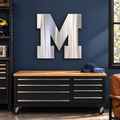 Michigan Wolverines block M Metal Wall Art in Polished Metal, displayed in a coordinated indoor Michigan fan space.