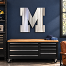 Michigan Wolverines block M Metal Wall Art in Polished Metal, displayed in a coordinated indoor Michigan fan space.