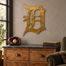 Old English D Metal Wall Art in Rustic, displayed in an indoor baseball fan setting.