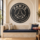 Paris Saint Germain matte black metal logo wall art in a bright apartment cafe nook.