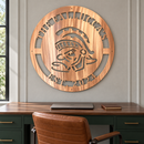 Sparty Monogram metal wall art in copper displayed in a home interior.