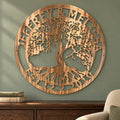 Tree of Life Monogram metal wall art in Copper Bronze above a dark oak cabinet on a sage green study wall.