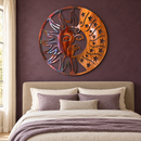 Twilight Moon gold rust and rainbow torched metal wall art above an upholstered bed against a plum wall.