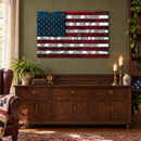 Weathered American Flag metal wall art with pledge lettering above a walnut credenza in an olive heritage study.